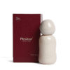 Ples’Jour Opal silicone lubricant in sculptural glass bottle beside burgundy box, representing luxury sexual wellness and intimacy.